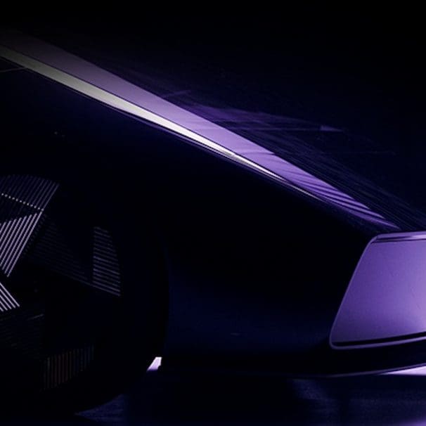 An abstract purple image of a part of an electric motorcycle.