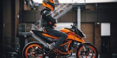 A KTM Duke 390 motorcycle on the road.
